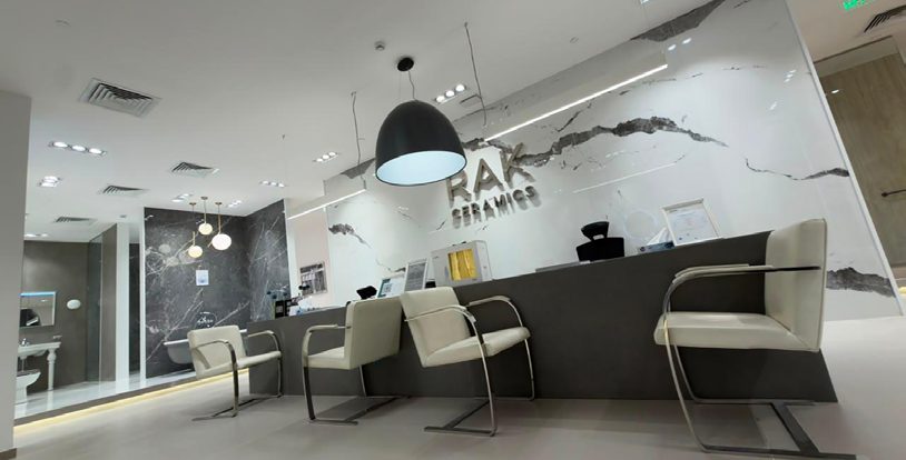 RAK Ceramics showroom reception with marble-effect walls